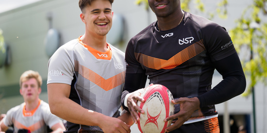 As student with a Rugby Coach.