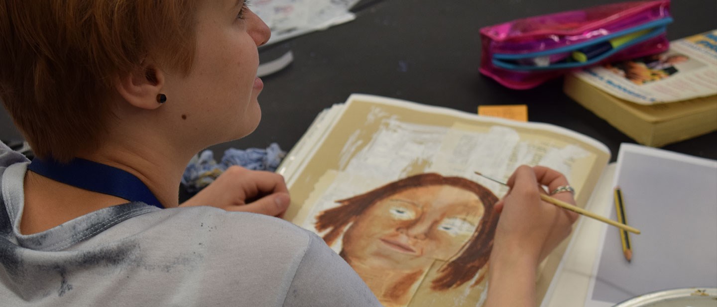 Fine Art student completing a portrait