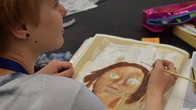 Fine Art student completing a portrait