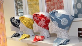 display of head scarfs created by a textiles student