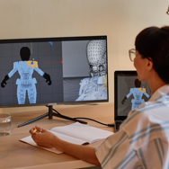 A female student working on animation graphics