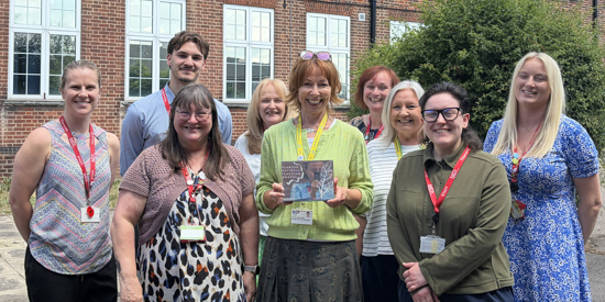 USP College staff celebrating their award win.