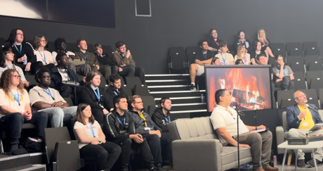 The audience behind speakers for the Jamie King Fireside Chat at Seevic Campus. 