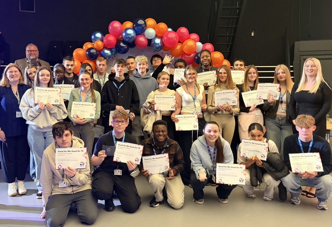 Group of USP College students holding up their awards.