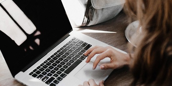 Student working on a laptop