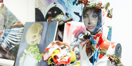 A collection of paintings, sculptures and artwork