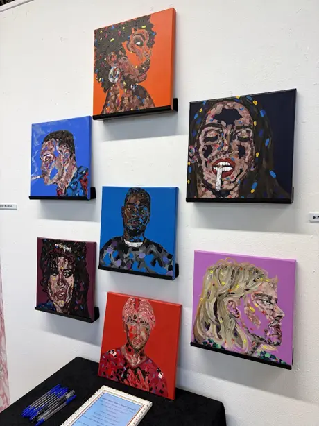 A photograph of 7 stylised paintings of famous figures in music.